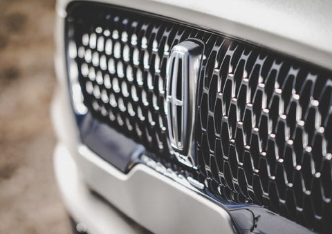 The grille of the 2024 Lincoln Aviator® Reserve model with an eye-catching repeated field of Lincoln Star logo shapes | Sheehy Lincoln of Richmond in Richmond VA