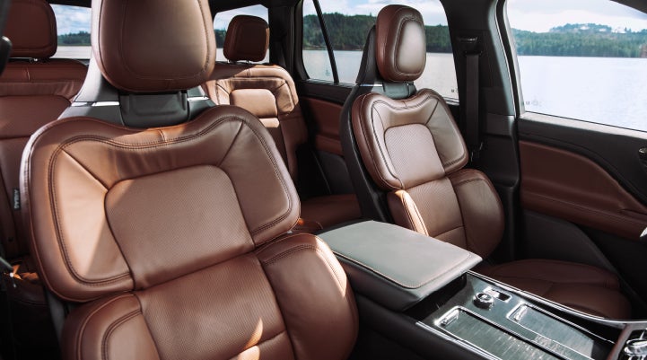 The front row's Perfect Position Seats in a 2024 Lincoln Aviator® Reserve model with Ebony Roast interior | Sheehy Lincoln of Richmond in Richmond VA