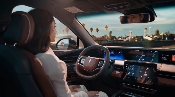 A person is shown driving hands-free on the highway with available Lincoln BlueCruise technology. | Sheehy Lincoln of Richmond in Richmond VA