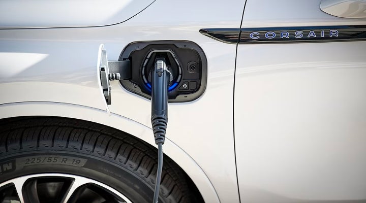 An electric charger is shown plugged into the charging port of a Lincoln Corsair® Grand Touring
model. | Sheehy Lincoln of Richmond in Richmond VA